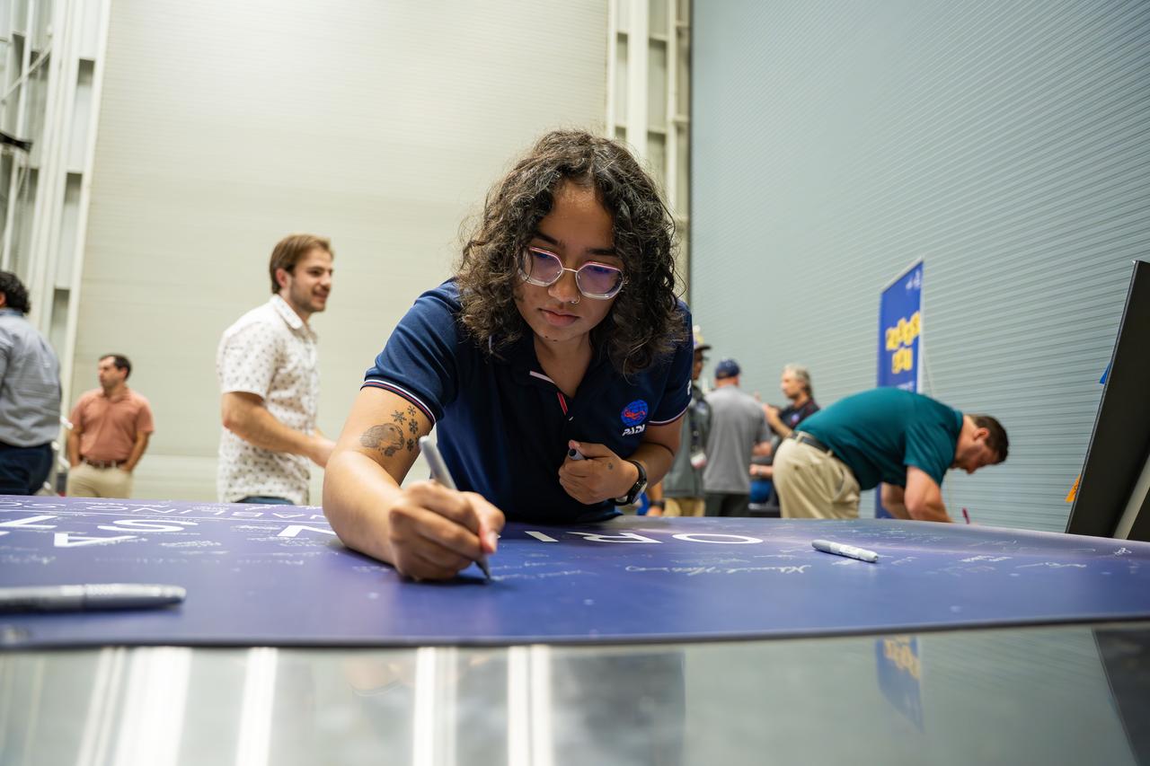 These images show NASA employees attending an event August 14, 2025, at Marshall Space Flight Center in Huntsville, Alabama, to view the Orion stage adapter for Artemis II before it is transported to NASA’s Kennedy Space Center in Florida. Manufactured entirely at NASA Marshall, the adapter plays a crucial role in connecting the SLS (Space Launch System) rocket’s interim cryogenic propulsion stage to the Orion spacecraft. This adapter is the final piece of SLS hardware to be delivered to Kennedy Space Center in preparation for the Artemis II mission.